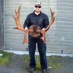 Bjorn Stolpe of Petersburg stands with the antlers of his legal moose taken near Pt. Agassiz. Photo courtesy of Rich Lowell