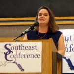 Maelani Schijvens presents "Southeast Alaska by the Numbers 2016" to the Southeast Conference in Petersburg, Sept. 20. Photo/Angela Denning