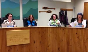 School officials sit in assembly chambers for the Aug. 11 meeting. (from left) Megan Litster, Sarah Holmgrain, Cheryl File, Erica Kludt-Painter. Photo/Angela Denning