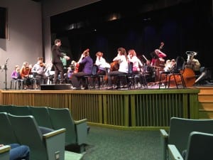The Juneau Student Symphony, with members of the Juneau Symphony, performs in the Wright Auditorium, directed by Troy Quinn.